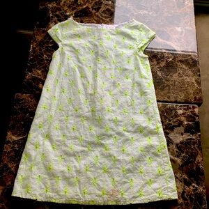 A neon dress size 7, white and yellow